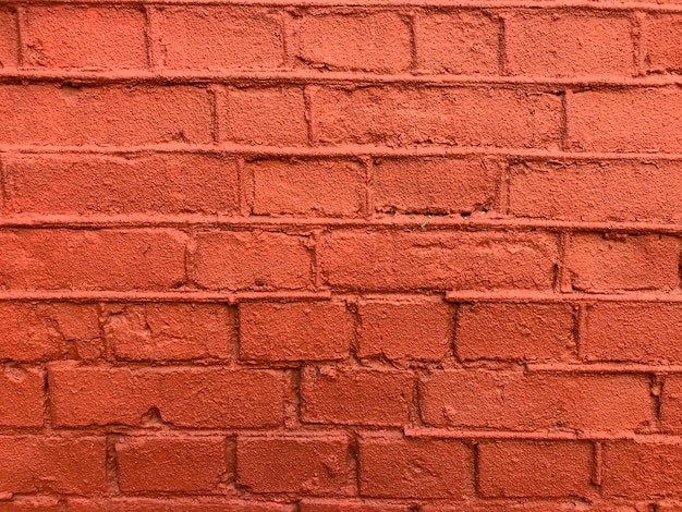 Muro di mattoni verniciato rosso.