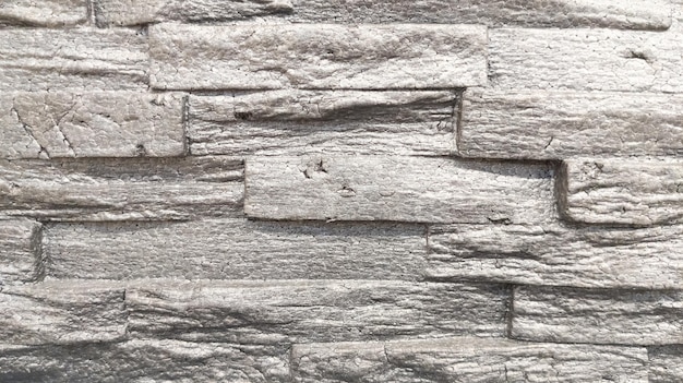 Muro di pietra vecchio mattone grigio muro di pietra fine muratura sfondo grigio texture