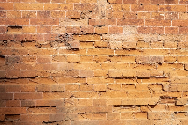 Muro di texture di pietra rossa Fondo di struttura del muro di mattoni