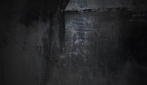 Muro scuro e nero concetto di sfondo di Halloween Cemento nero polveroso per lo sfondo Trama di cemento horror