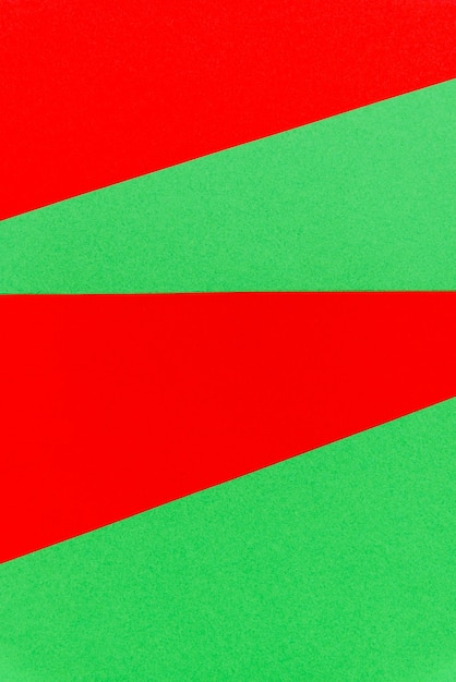 Natale astratto rosso su sfondo verde fogli Sfondo di texture di carta colorata brillante