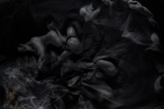 Nero grigio fumo astratto sfondo vernice acrilica esplosione subacquea inchiostro vorticoso