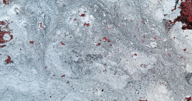 Neve gelo sfondo astratto freddo inverno ghiaccio superficie congelata rosso bianco grigio particelle di grano