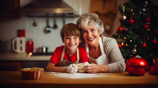 Nipote e nonna sono in cucina a preparare il pan di zenzero natalizio