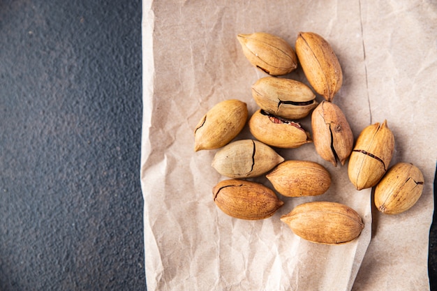 Noce pecan porzione fresca pronta da mangiare spuntino pasto sul tavolo spazio copia sfondo cibo rustico