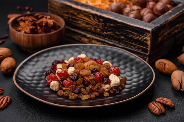 Noci pecan tostate e noci di macadamia bacche secche di mandarino essiccate