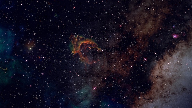 Nube di gas della nebulosa dell'universo colorato luminoso astratto nello spazio profondo