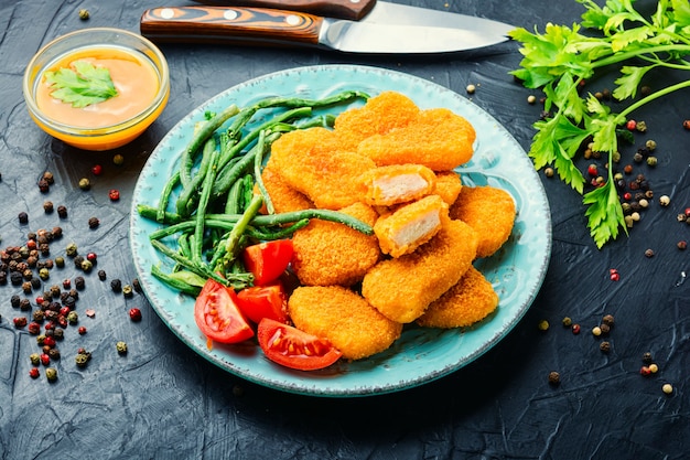 Nuggets con verdure