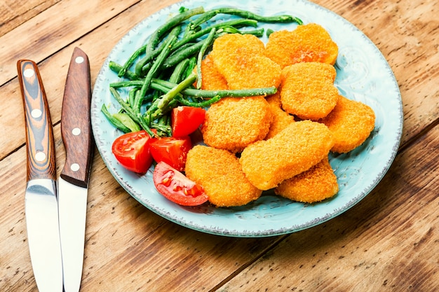 Nuggets con verdure