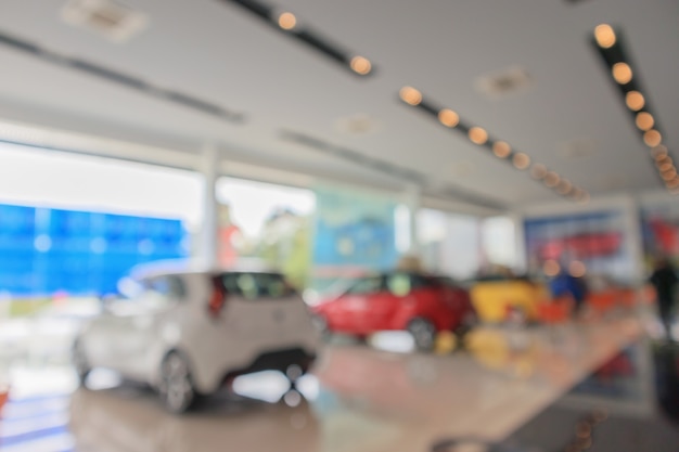 Nuove auto in showroom sfocato sfondo sfocato