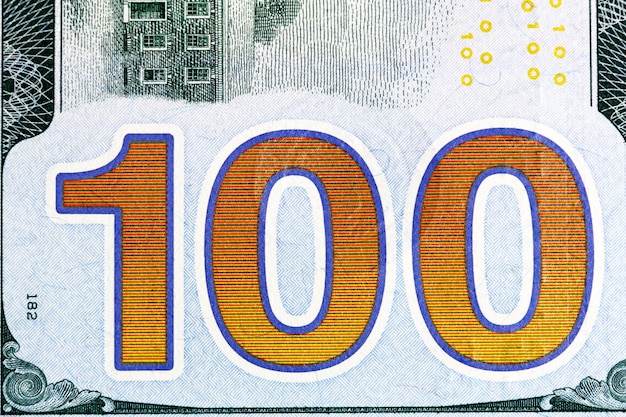 Nuovo colpo del primo piano della banconota da cento dollari. Foto ad alta risoluzione.