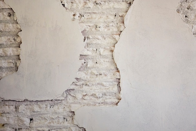 Nuovo fondo bianco di corrosione del muro di mattoni