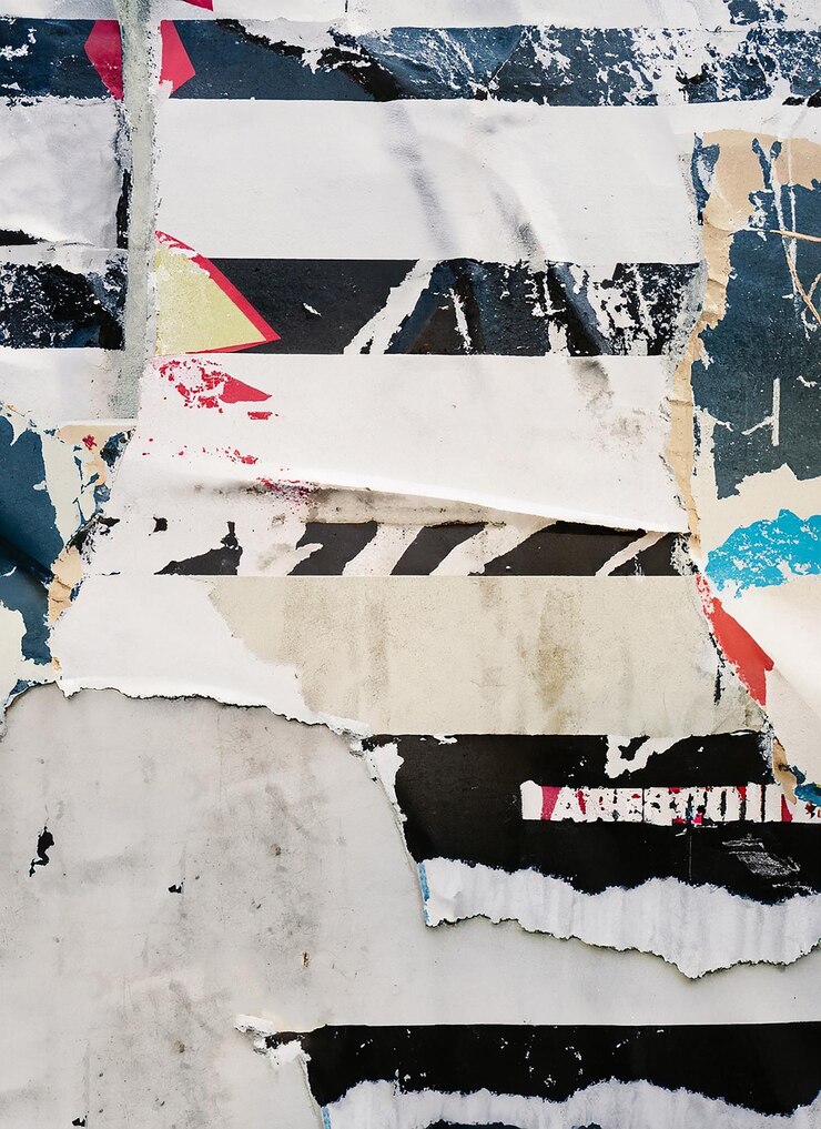 Old ripped torn grunge posters and backgrounds creased crumpled paper backdrop surface
