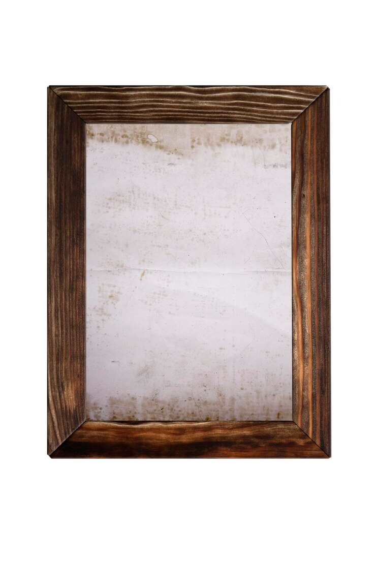 Old wooden frame with old paper isolated on white background