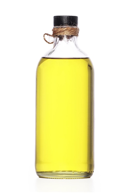 Olio da cucina in bottiglia su sfondo bianco