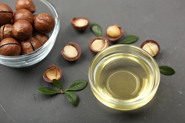 Olio di macadamia sul tavolo minimalismo posto per il testo