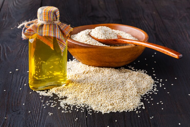 Olio di sesamo in vetro e semi