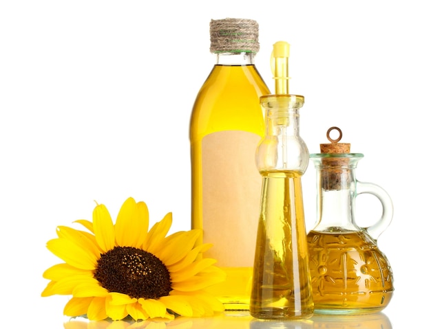 Olio in barattolo e girasole isolato su bianco