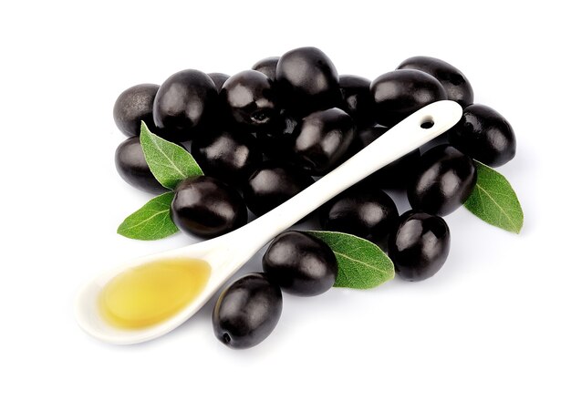 Olive e cucchiaio di olio d'oliva