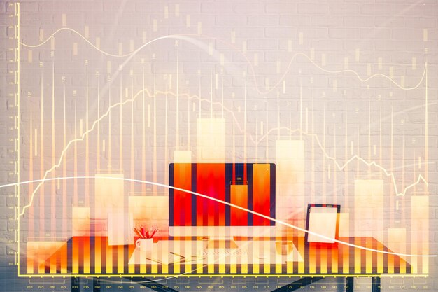 Ologramma del grafico del mercato Forex e personal computer sullo sfondo Esposizione multipla Concetto di investimento