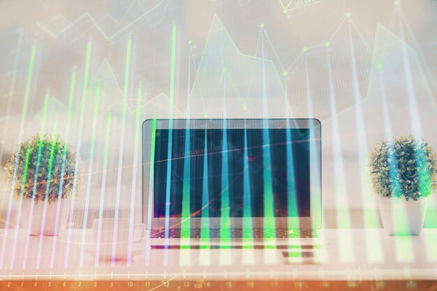 Ologramma del grafico forex su tavolo con sfondo informatico Multi esposizione Concetto di mercati finanziari