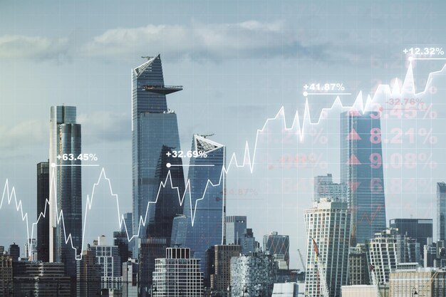 Ologramma grafico finanziario virtuale astratto sullo sfondo del paesaggio urbano di New York concetto finanziario e commerciale Multiexposure