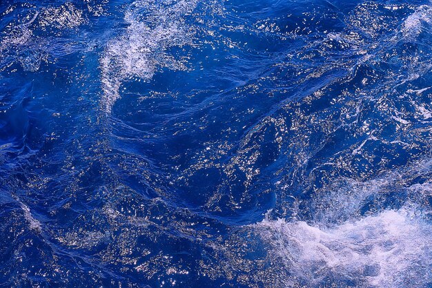 onde astratte del fondo dell'acqua di mare/sfondo blu, acqua bagnata dell'oceano della natura con le increspature