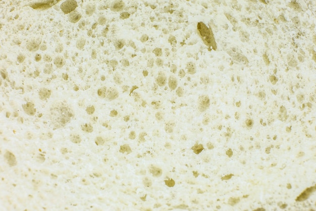 Pagnotta di pane bianco all'interno della trama di sfondo Concetto di panetteria Primo piano foto macro