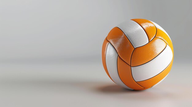 Pallavolo arancione e bianco su uno sfondo grigio pallido La palla è leggermente inclinata a destra del fotogramma