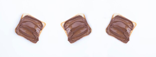 Pane alla crema di cioccolato sullo sfondo bianco Copia spazio Vista dall'alto