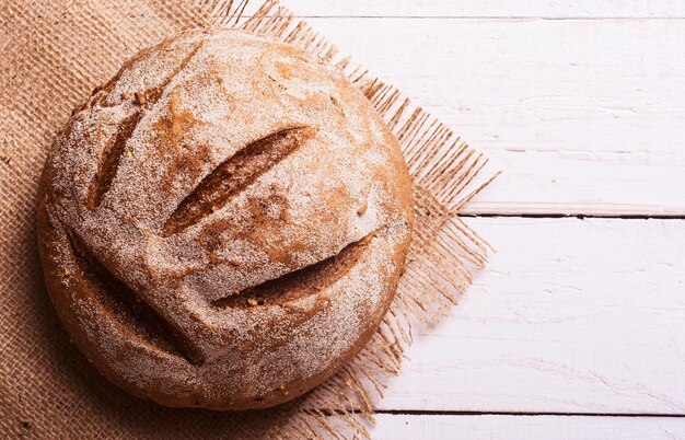 pane fresco sul legno Sfondo di cibo