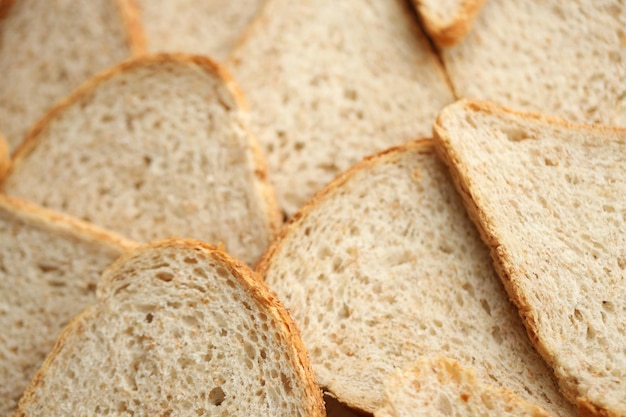 Pane tagliato fresco in macrofoto a tutto fotogramma da vicino