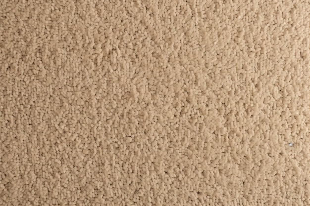 Panorama beige di consistenza di tappeto scuro modello vuoto vuoto con spazio di copia per il design del prodotto o il testo