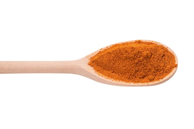 Paprika in un cucchiaio di legno