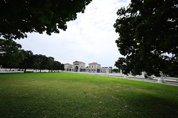 Parco con canale su piazza Prato della Valle e Basilica di Santa Giustina a Padova Veneto Italia