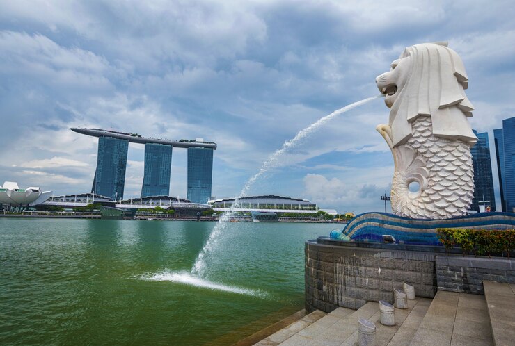 Foto parco di merlion a singapore con il fondo della baia del porticciolo