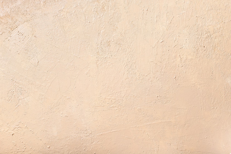 Foto parete beige neutra astratta. sfondo con texture. messa a fuoco selettiva.