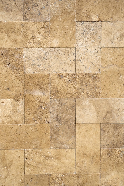 Parete di pietra cubica decorativa come struttura del fondo