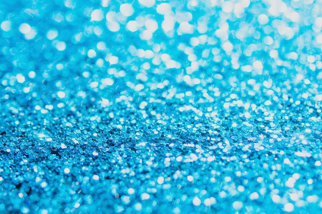 Parete sfocata glitter blu