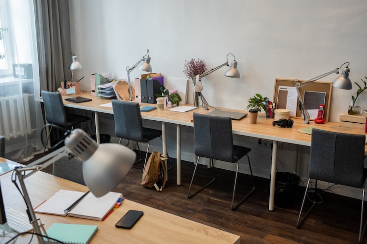 Photo part of contemporary office with workplaces for employees