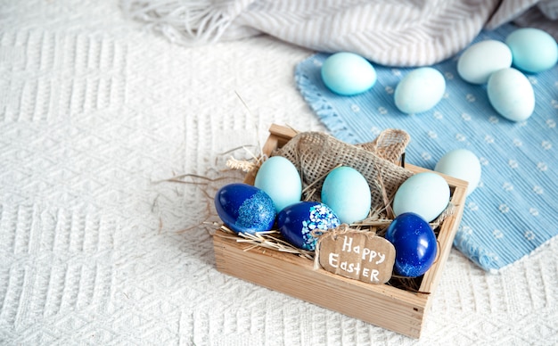 Pasqua ancora in vita con uova blu, decorazioni per le vacanze