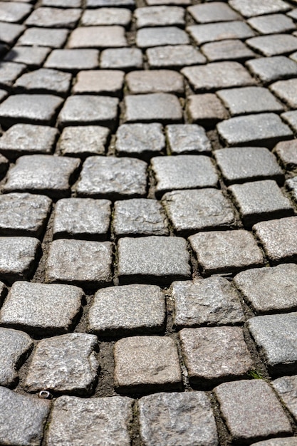 Pavimentazione in ciottoli sulla vecchia struttura del fondo della strada