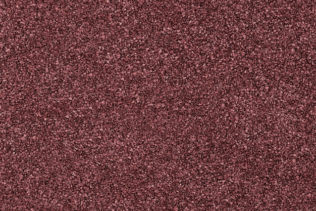 Pavimento in gomma rosso marrone texture di sfondo Granuli parco giochi coprire sfondo senza soluzione di continuità