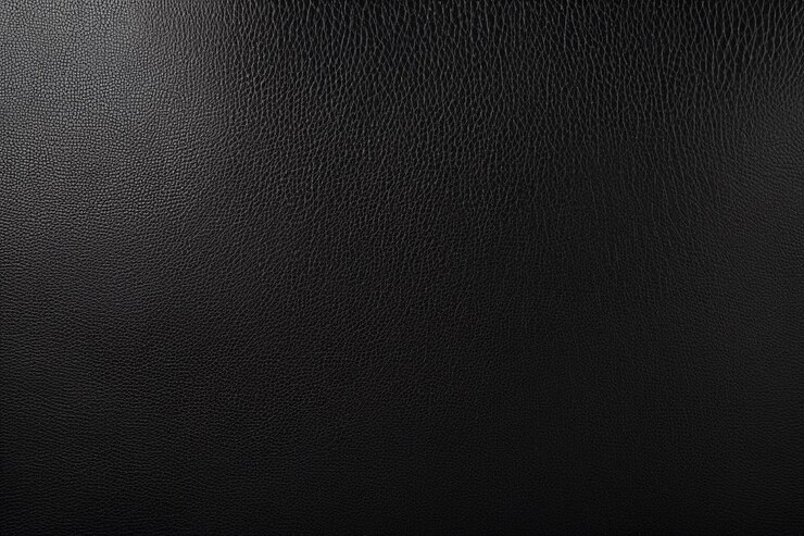 pelle nera lucidata a grana fine che forma uno sfondo elegante e lussuoso