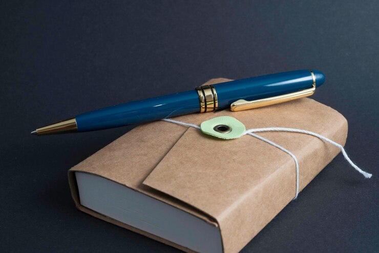 Photo pen on book
