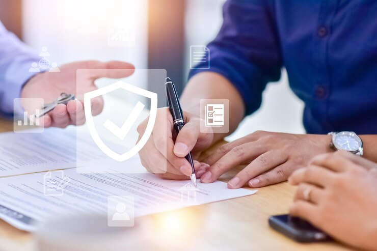 Photo people signature for buy insurance concept hand signature document for life insurance investment