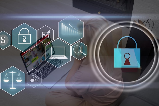 Person using a laptop computer with technology cybersecurity and privacy concept. protection and safe data for global network security.