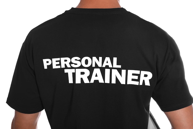 Personal trainer su sfondo bianco vista posteriore Istruttore di palestra