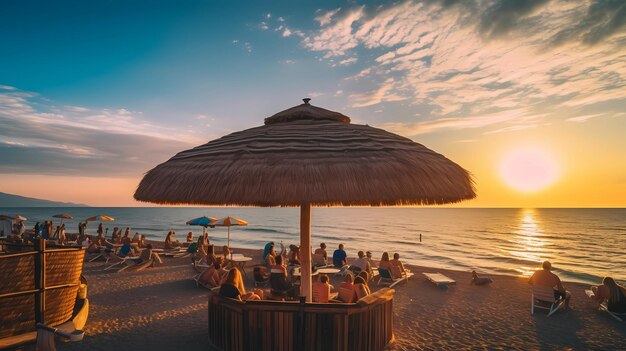 persone che si rilassano sulla spiaggia al tramonto in mare in Grecia