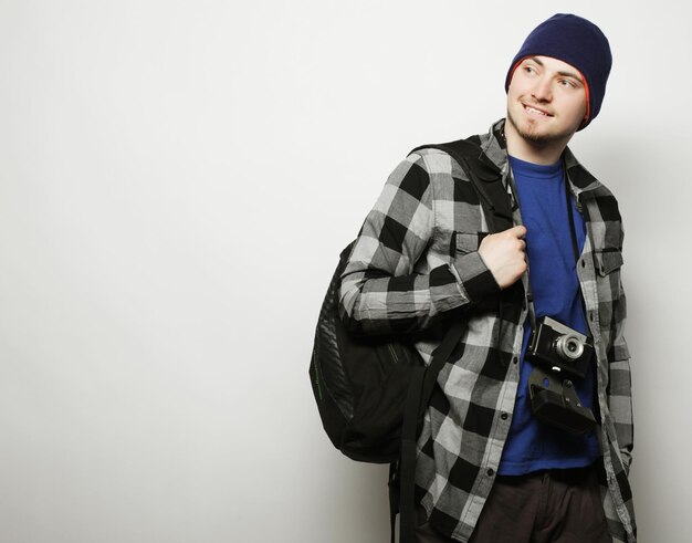 Persone di tecnologia e concetto di stile di vita giovane fotografo su sfondo bianco